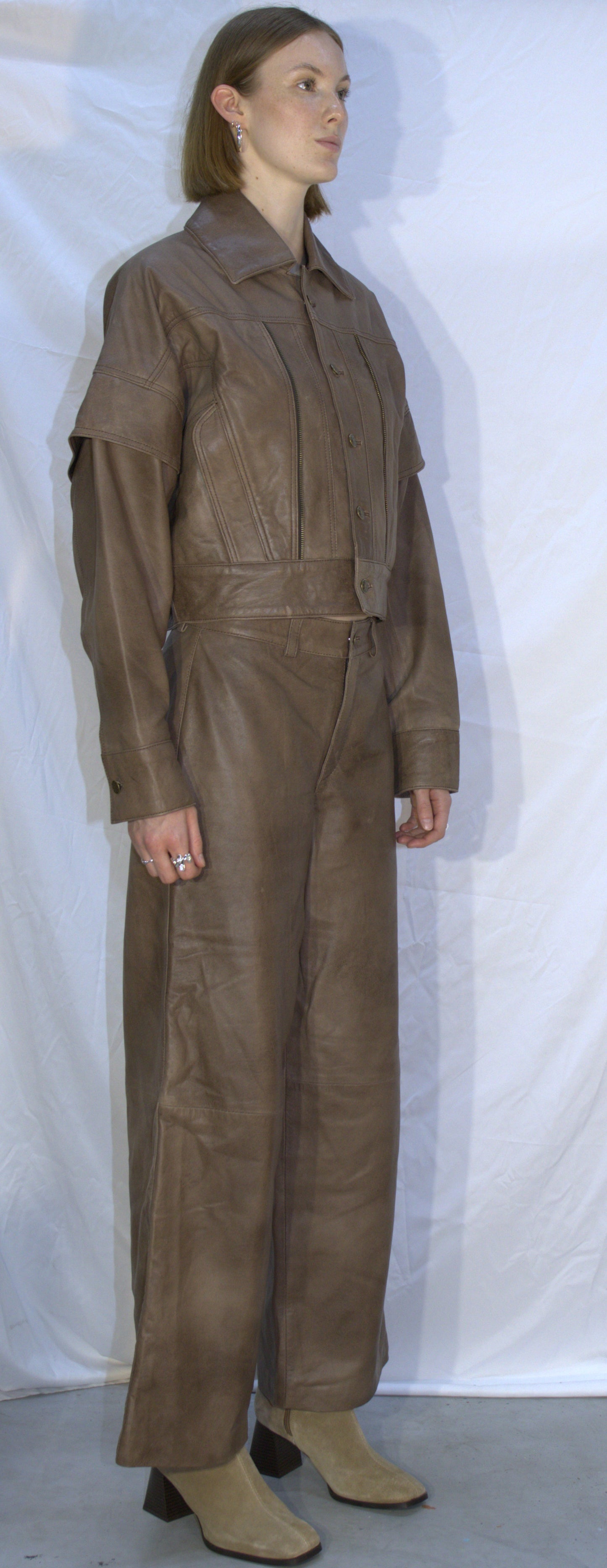 Panel flared leather pants in beige - KOSTANAI