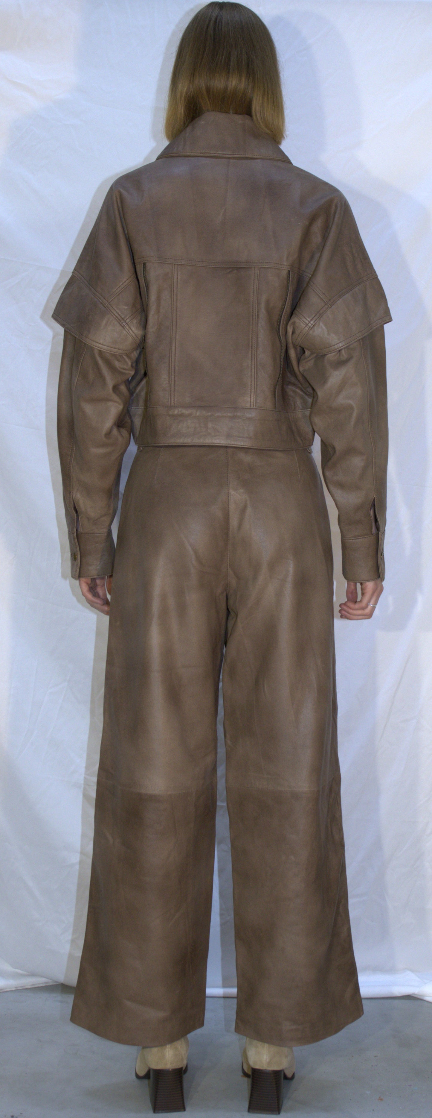 Panel flared leather pants in beige - KOSTANAI