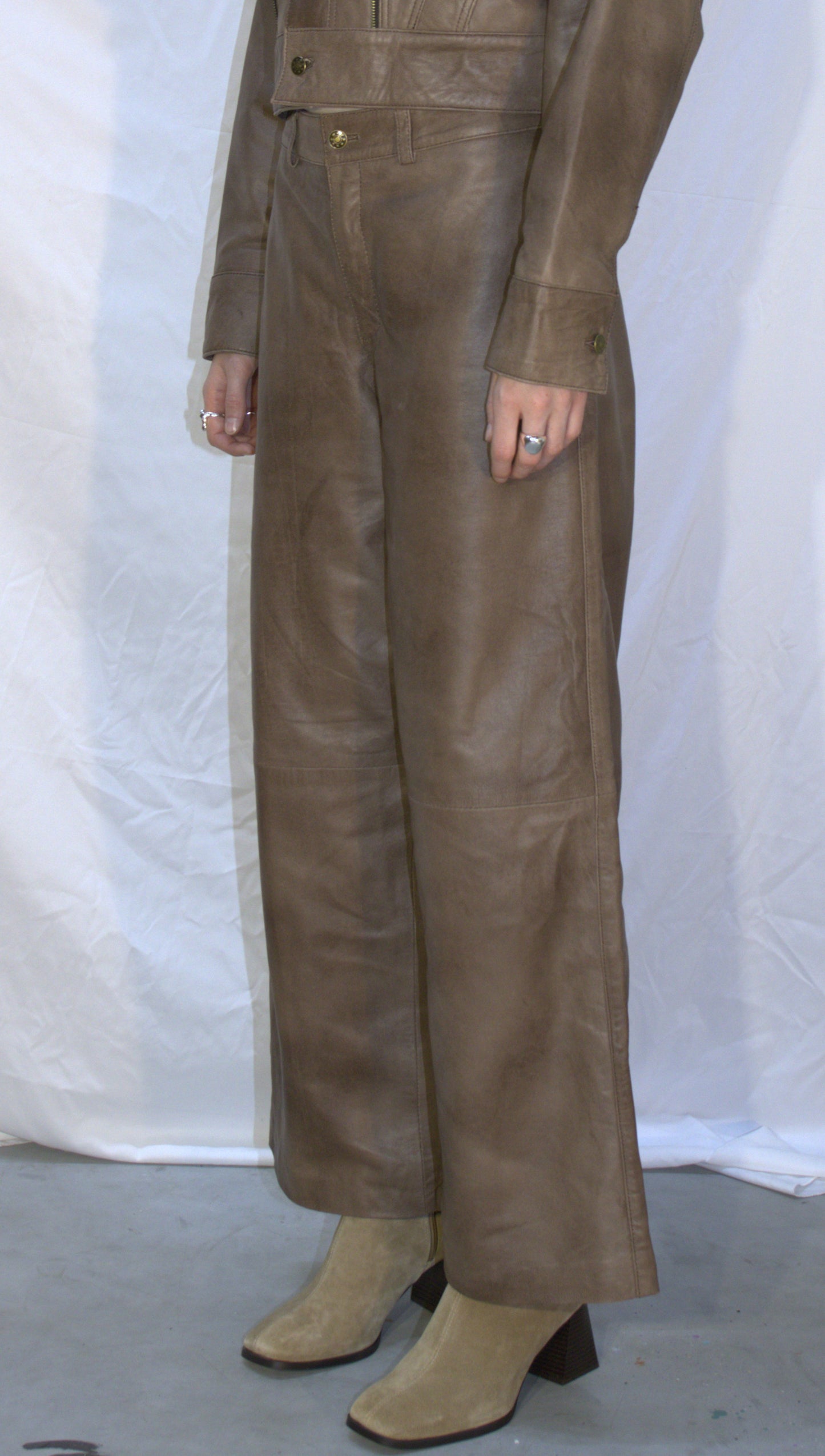 Panel flared leather pants in beige - KOSTANAI