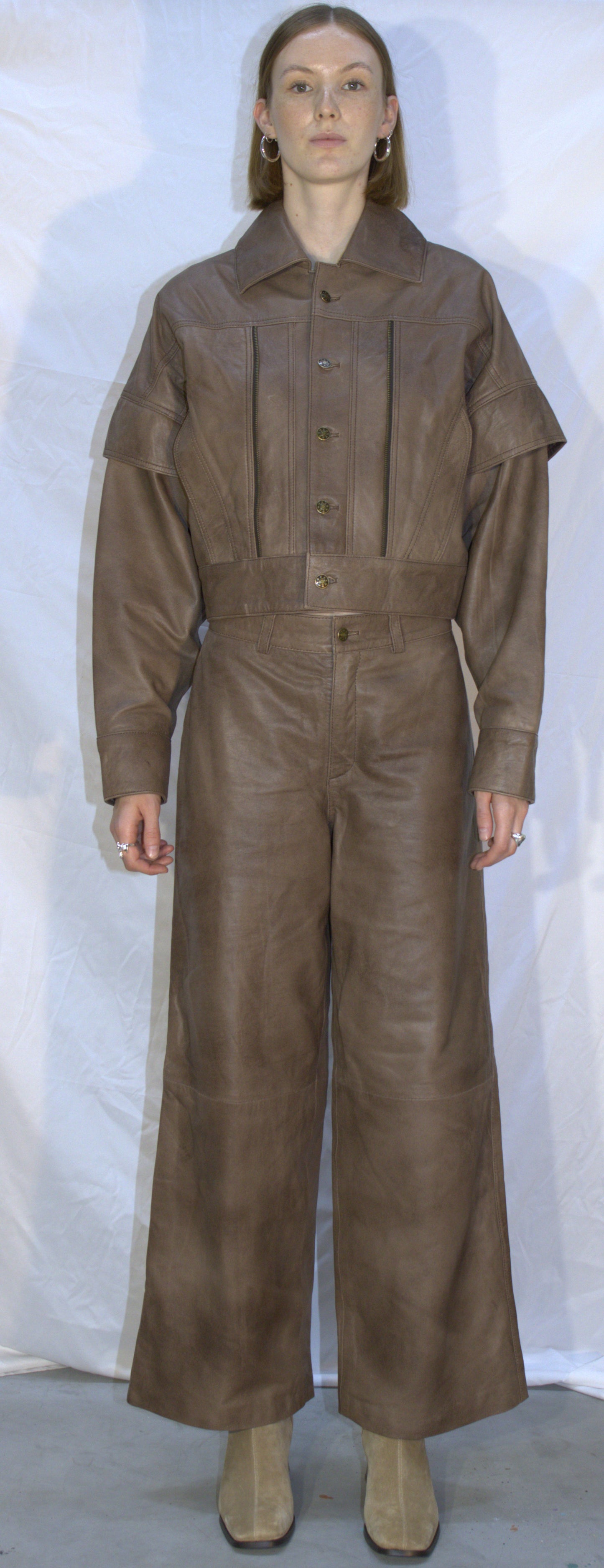 Panel flared leather pants in beige - KOSTANAI